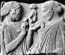 Ancient Carving from Eleusis (450 BCE) showing Persephone and Demeter sharing "sacred" mushrooms upon Persephones Return