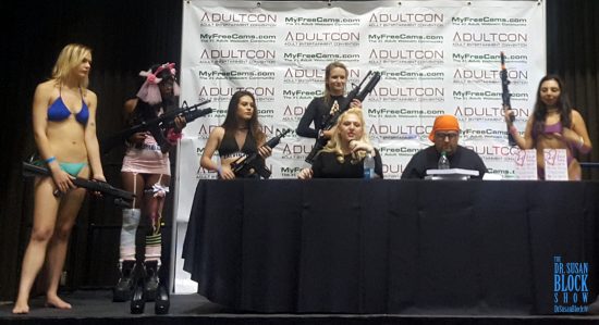 Pornstars Wielding Guns (I Hope They're Fake!) Preceded Me Onstage at Adultcon. Photo: Author