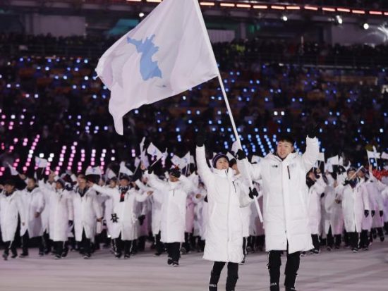 Korean Valentine: The North & South march together into the 2018 Winter Olympics with Bonoboesque Hopes for Peace. Meanwhile Pence takes a knee for the U.S. War Machine.