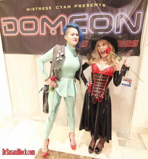 In Demask Latex, with Goddess Soma Snakeoil at Mistress Cyan's DomCon 2018. Photo: Abe Bonobo