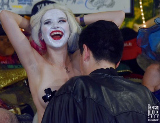 Bruce Wayne receives Bonoboville Communion from Altar Girl Harley Quinn. Photo: Anastasia