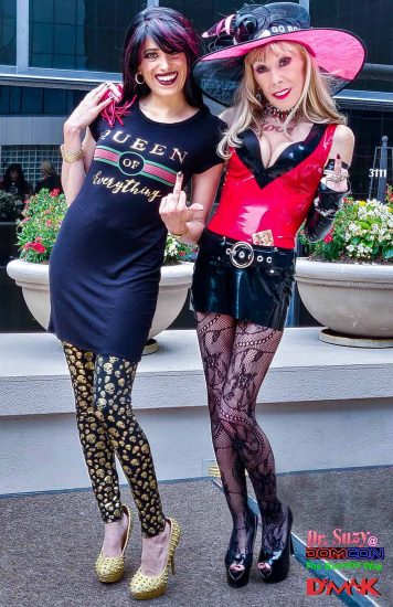 Giving the traditional DomCon "finger" with "Sexiest Domme" SUZY award winner, Madame Raven Rae. Photo: Jux Lii
