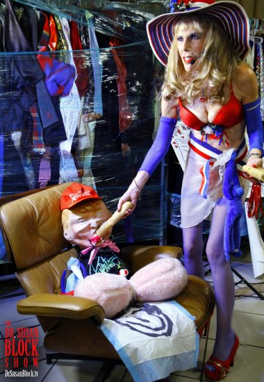 Putting our tRump voodoo doll under gag order with a baguette before spanking him with another one. Photo: Harry Sapien
