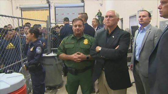 Pence looking tense at the refugee camp