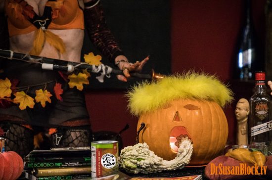 BOOnoBOOville Trumpkin.gagged by a gourd. Yes, the Billdo the Bill Clinton dildo to his left and a can of Impeachment Peaches to his right.. Photo: Jux Lii
