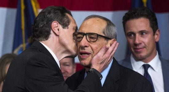 In the pre-Physical Distancing era: Governor Andrew kisses Papa Mario as Brother Chris watches.